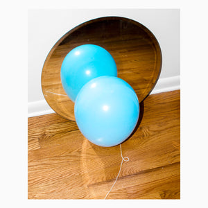 Artsuite - Ben Alper - Balloon. An image of a balloon and it's reflection.