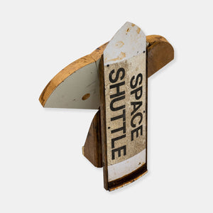 Artsuite - Jeff Bell - Space Shuttle - Original sculpture out of wood and steel.  Bell's found object-based sculptural work expresses the relationship between materials and memory. Delving into that relationship, he has found a connection between coming of age, nostalgia, and death that is rooted in several personal memories around pop culture.