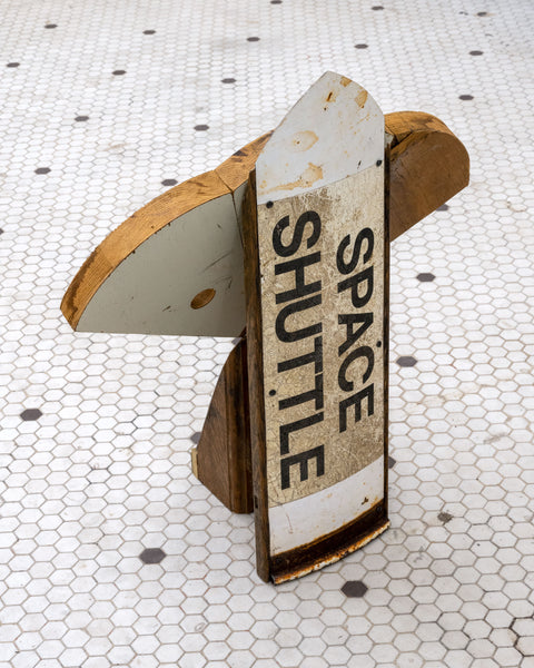 Artsuite - Jeff Bell - Space Shuttle - Original sculpture out of wood and steel. Bell's found object-based sculptural work expresses the relationship between materials and memory. Delving into that relationship, he has found a connection between coming of age, nostalgia, and death that is rooted in several personal memories around pop culture.